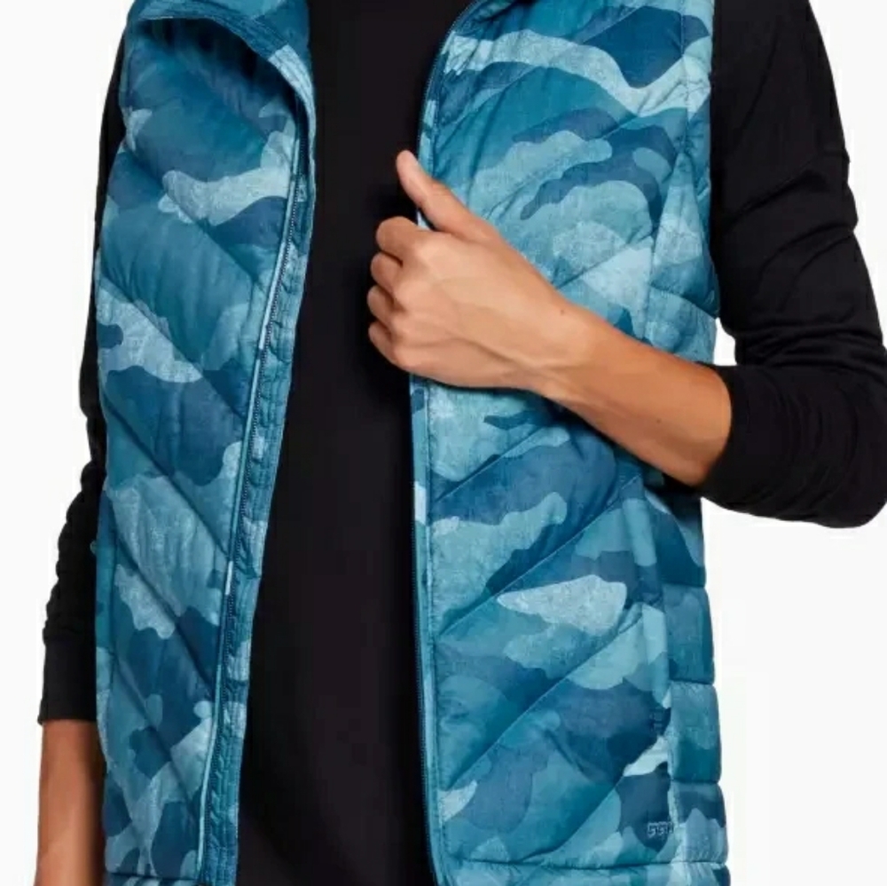 Blue camo print north face vest.